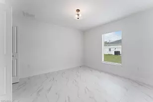 1042 Cheney Ave S, Lehigh Acres, FL 33974 - Photo 28