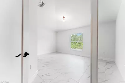 1042 Cheney Ave S, Lehigh Acres, FL 33974 - Photo 20