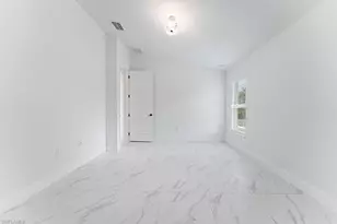 1042 Cheney Ave S, Lehigh Acres, FL 33974 - Photo 16