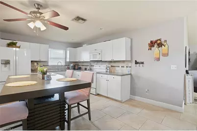 906 Venice Ave N, Lehigh Acres, FL 33971 - Photo 14