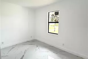 612 Ames St E, Lehigh Acres, FL 33974 - Photo 12