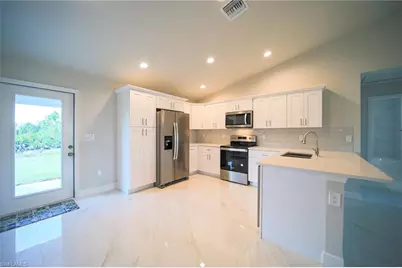 2009 Voss Ct, Lehigh Acres, FL 33972 - Photo 2