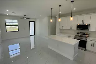 528 Raintree St E, Lehigh Acres, FL 33974 - Photo 1