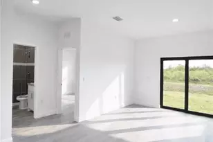 1054 Ainsworth St E, Lehigh Acres, FL 33974 - Photo 2