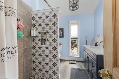 16353 Buccaneer St, Bokeelia, FL 33922 - Photo 18