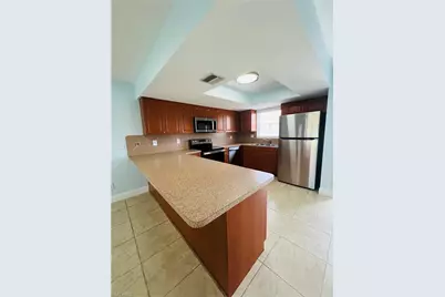 1406 SE 2nd Pl #1, Cape Coral, FL 33990 - Photo 6