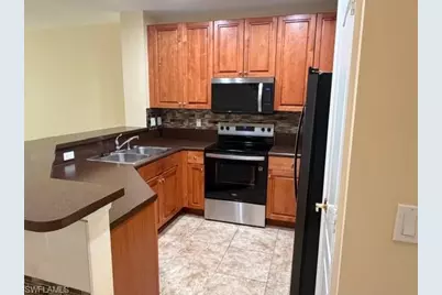 8585 Athena Ct, Lehigh Acres, FL 33971 - Photo 6