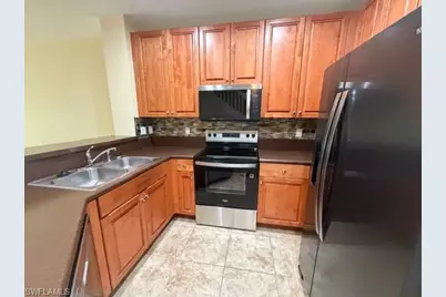 8585 Athena Ct, Lehigh Acres, FL 33971 - Photo 10