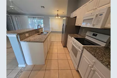 1912 Sunshine Blvd S, Lehigh Acres, FL 33976 - Photo 6