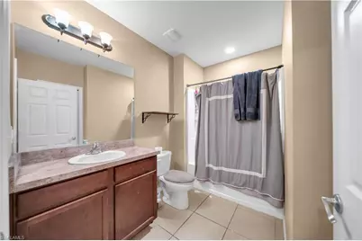 10549 Canal Brook Ln, Lehigh Acres, FL 33936 - Photo 22