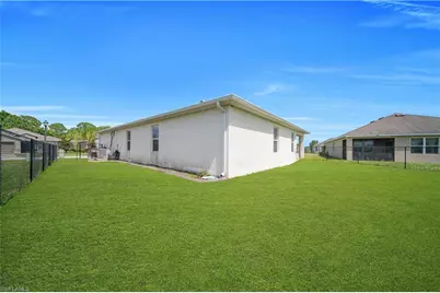 10549 Canal Brook Ln, Lehigh Acres, FL 33936 - Photo 30
