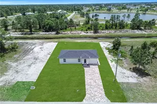 1042 Darlington St, Lehigh Acres, FL 33974 - Photo 18