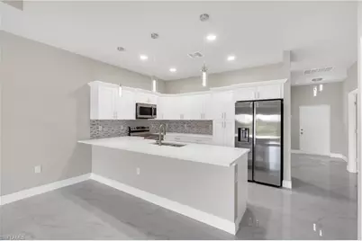 917 Margaret Ave S, Lehigh Acres, FL 33974 - Photo 4