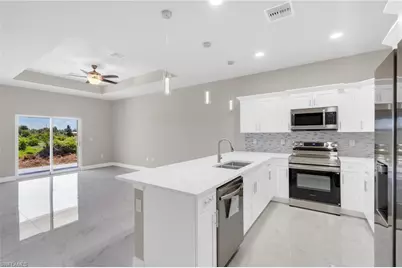 917 Margaret Ave S, Lehigh Acres, FL 33974 - Photo 6