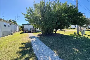 5675 Pine Island Rd NW, Bokeelia, FL 33922 - Photo 20