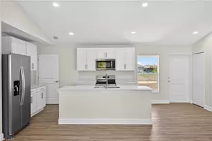 702 NW Douglas Cir, Cape Coral, FL 33993 - Photo 6