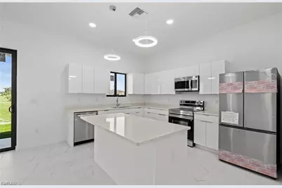 3927 NW 40th Ter, Cape Coral, FL 33993 - Photo 8