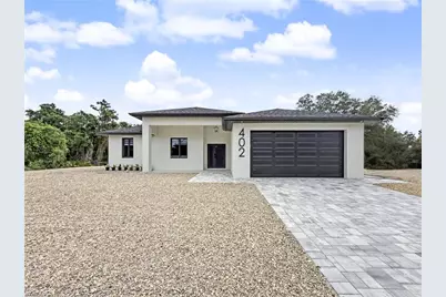 402 Thompson Ave, Lehigh Acres, FL 33972 - Photo 1