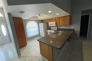 1409 SW 10th St, Cape Coral, FL 33991 - Photo 6