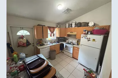 3123 Pine Tree Dr, Naples, FL 34112 - Photo 6