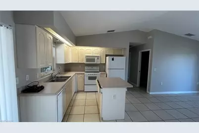 10738 Cocoatree Ct, Lehigh Acres, FL 33936 - Photo 4