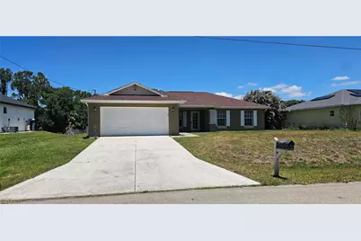 815 Porter St E, Lehigh Acres, FL 33974 - Photo 1