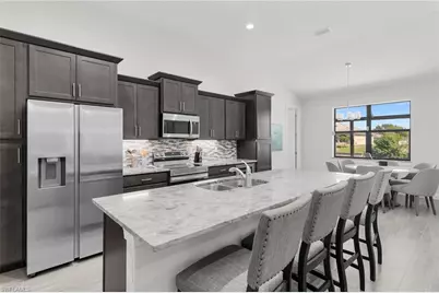 635 NE 7th Ter, Cape Coral, FL 33909 - Photo 18