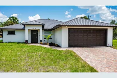 303 E 7th St, Lehigh Acres, FL 33972 - Photo 1