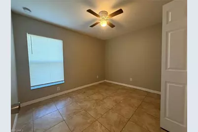 835 Downer Ave S, Lehigh Acres, FL 33974 - Photo 14