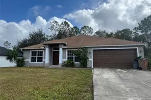 835 Downer Ave S, Lehigh Acres, FL 33974 - Photo 1
