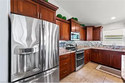 1250 Silverstrand Dr, Naples, FL 34110 - Photo 16