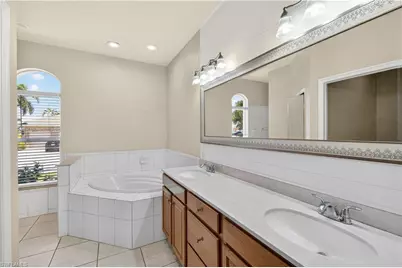 7930 Sandel Wood Cir W, Fort Myers, FL 33908 - Photo 20