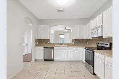 9729 Heatherstone River Ct #3, Estero, FL 33928 - Photo 16