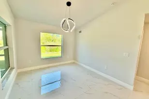 1017 Maple Ave N, Lehigh Acres, FL 33972 - Photo 16