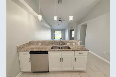 1405 Nelson Rd N, Cape Coral, FL 33993 - Photo 10