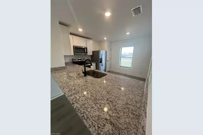 448 Burrstone Dr, Lehigh Acres, FL 33974 - Photo 2