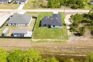 850 Foxtail St, Lehigh Acres, FL 33974 - Photo 32
