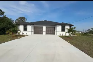 406 Chalet Ave S, Lehigh Acres, FL 33974 - Photo 1