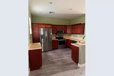 1154 Damen St E, Lehigh Acres, FL 33974 - Photo 2