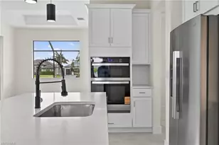 817 NW 38th Pl, Cape Coral, FL 33993 - Photo 12