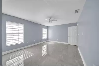 538 Whispering Wind Bend, Lehigh Acres, FL 33974 - Photo 18