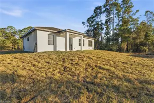 566 Eisenhower Blvd, Lehigh Acres, FL 33974 - Photo 30