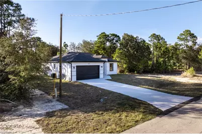 566 Eisenhower Blvd, Lehigh Acres, FL 33974 - Photo 2