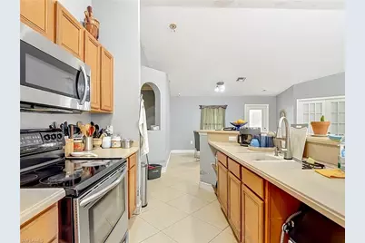 704 Moore Ave, Lehigh Acres, FL 33972 - Photo 18