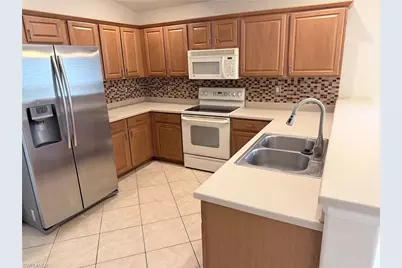 9728 Gladiolus Bulb Loop, Fort Myers, FL 33908 - Photo 2