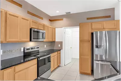 7894 Sandel Wood Cir W, Fort Myers, FL 33908 - Photo 18
