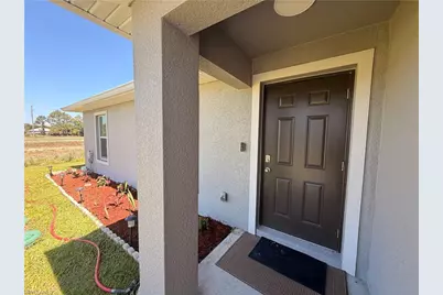 4702 Loraine Ave S, Lehigh Acres, FL 33976 - Photo 4