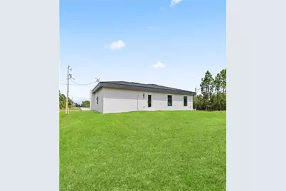 908 Capetown Ave, Lehigh Acres, FL 33974 - Photo 18