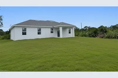 3120 72nd St W, Lehigh Acres, FL 33971 - Photo 2