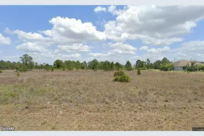 727 Frontenac Ave S, Lehigh Acres, FL 33974 - Photo 1